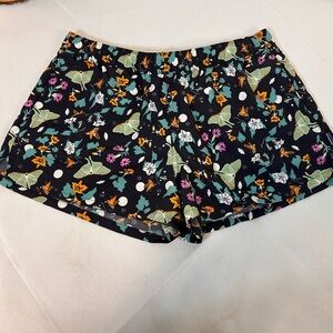 Patagonia Black Athletic Shorts with Green, Orange & Pink Floral Print